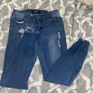 Blue jeans with rips